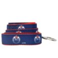 Perfect for walks in Portage la Prairie, Winnipeg, Brandon, Selkirk, and Steinbach, and throughout Manitoba with the Edmonton Oilers All Star NHL Leash 4′. Crafted with double-stitched grosgrain ribbon and featuring a printed team logo on premium American-made webbing, this leash combines durability with style. Complete with top-quality American-made hardware and licensed by the NHL, it's the perfect choice for local fans who want to proudly display their team spirit during every walk.